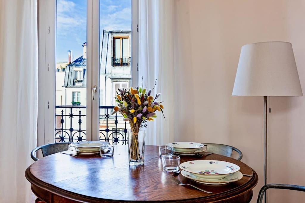 Charmant Appartement Au Coeur De ปารีส ภายนอก รูปภาพ