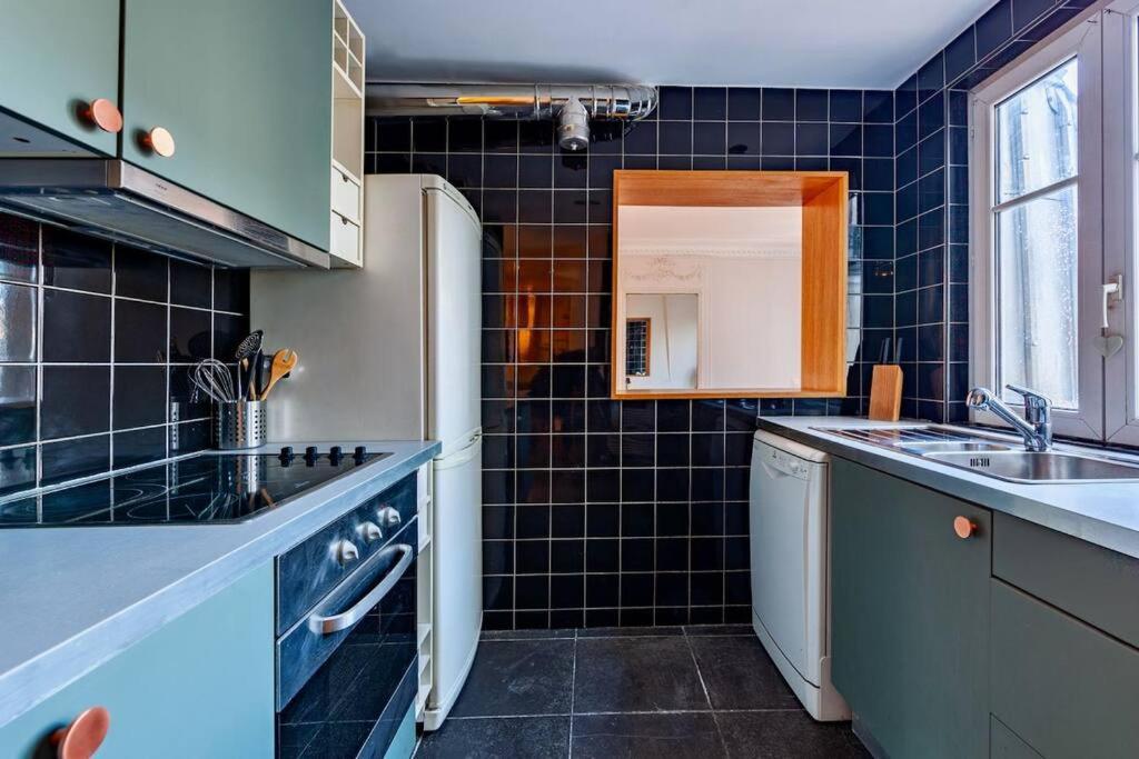 Charmant Appartement Au Coeur De ปารีส ภายนอก รูปภาพ