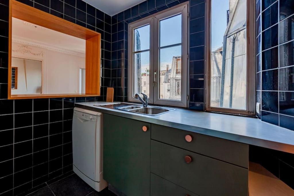 Charmant Appartement Au Coeur De ปารีส ภายนอก รูปภาพ